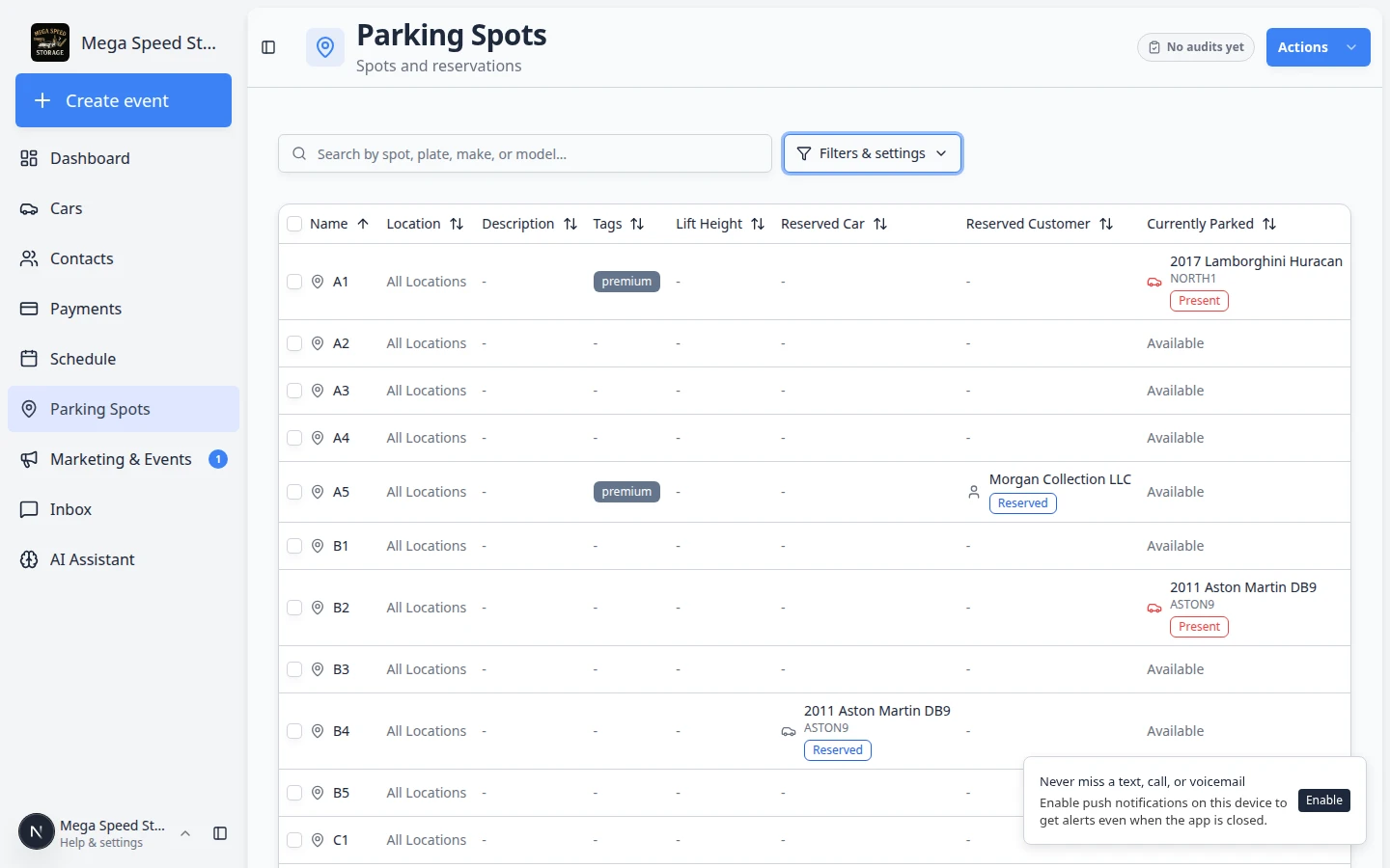 Parking Spots table row menu open showing Reserve Spot and other actions for an available spot